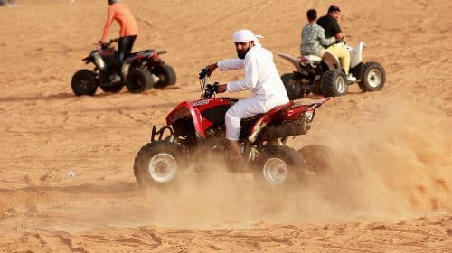 1-Hour Quad Bike Adventure: BBQ Dinner, Sandboarding & Shows! Day Tours