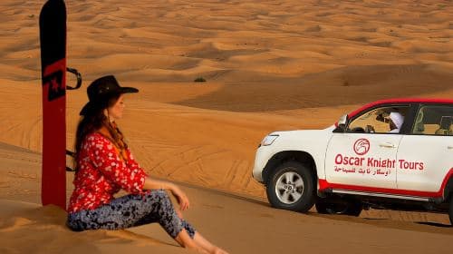 High Red Dunes with Camel Ride, Sandboarding, Falcon Show and VIP BBQ Dinner Day Tours