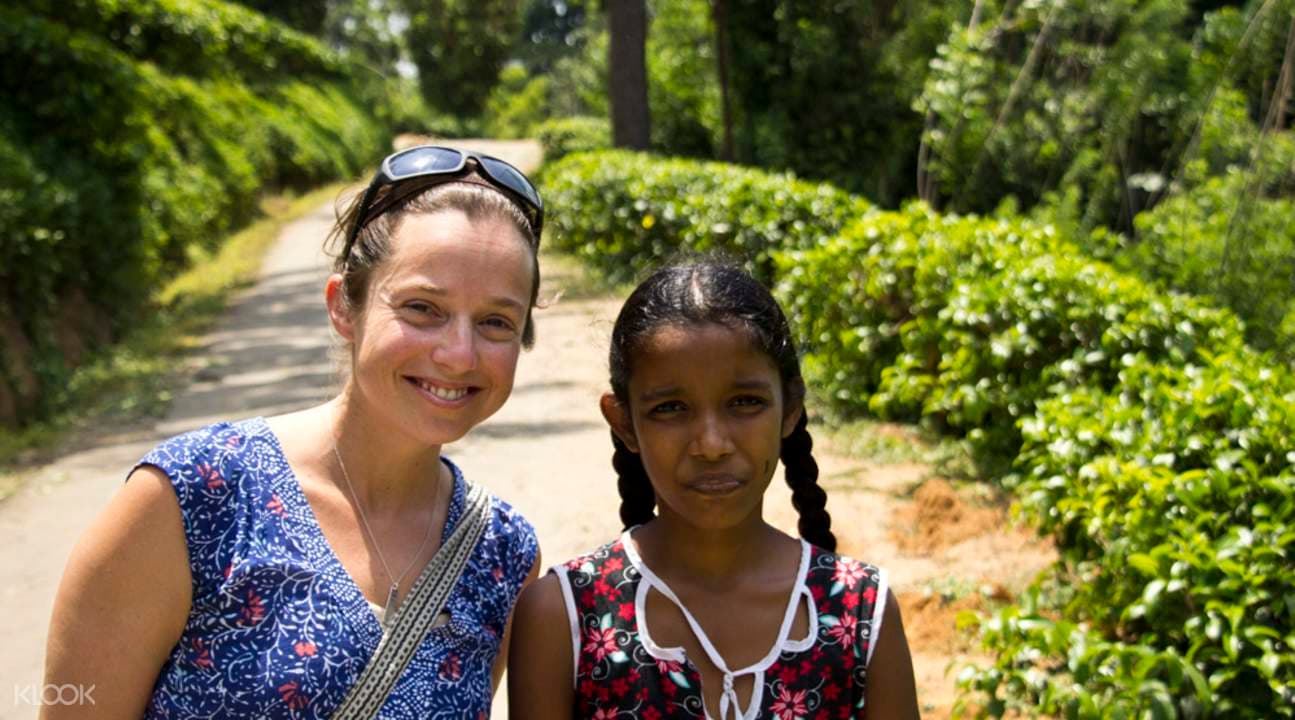 Waterfalls, Tea Plantation, and Ancestors Village Day Tour from Kandy