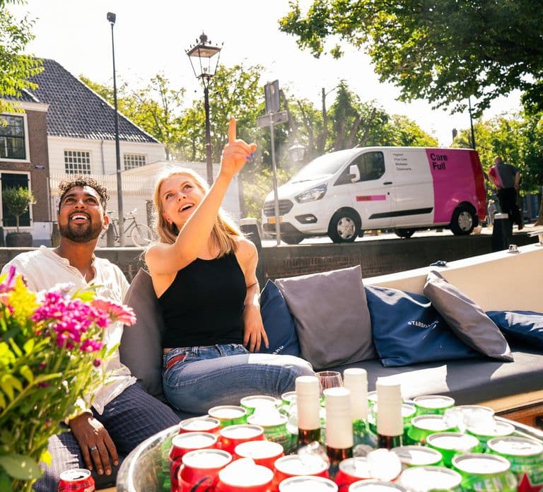 Amsterdam: Private Canal Booze Cruise with Unlimited Drinks
