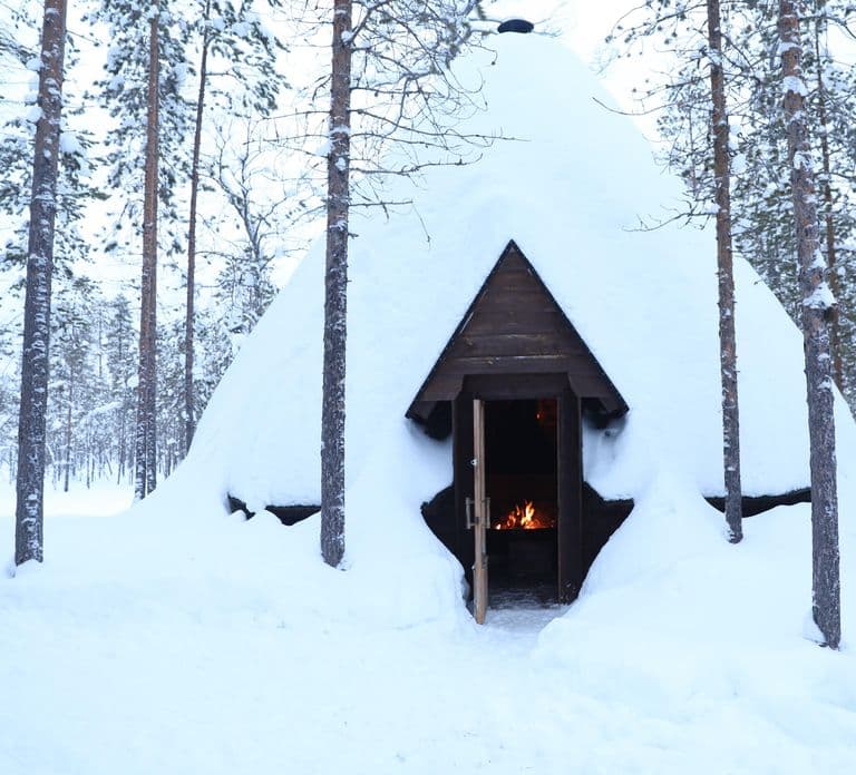 Ylläs: Snowmobile safari to forest kota with family company