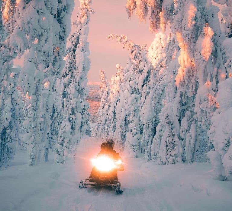 Ylläs: Snowmobile safari to forest kota with family company