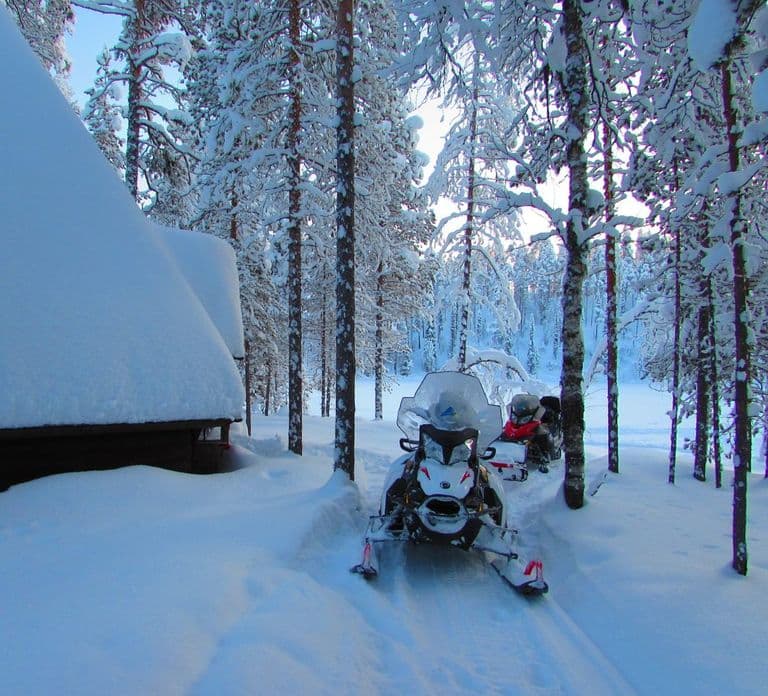 Ylläs: Snowmobile safari to forest kota with family company