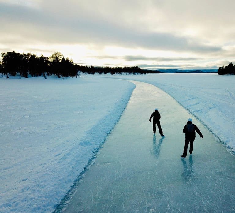 From Saariselkä: Ice-skating on Frozen Lake Inari