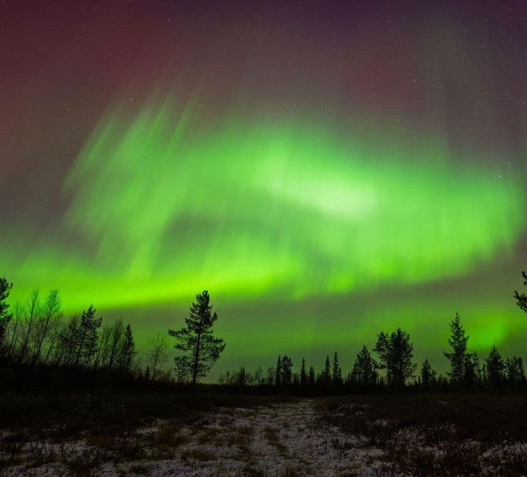 Lapônia: Caça à Aurora Boreal em Minivan com Guia e Transporte