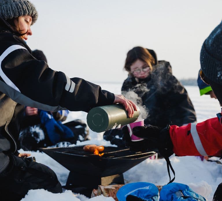 Rovaniemi: Ice Fishing & Snowmobile Safari Combo Day