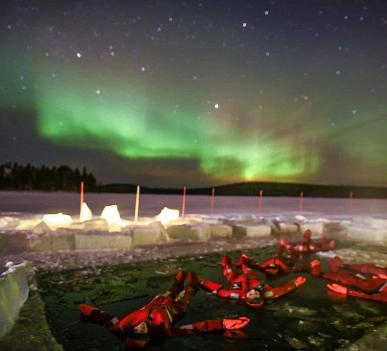 Rovaniemi: IJsdrijven in een bosmeer met het noorderlicht
