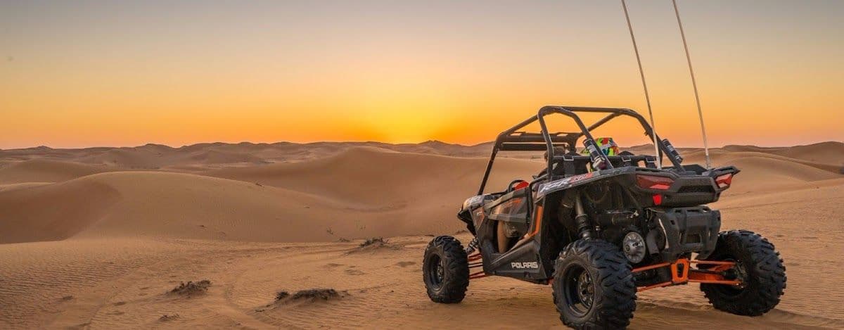 Dubai desert camp experience with dune bashing - red dune bashing/transfers/sunset/camel ride/Arabian buffet diner/henna painting/show - standard/VIP/summer air-conditioned area options available