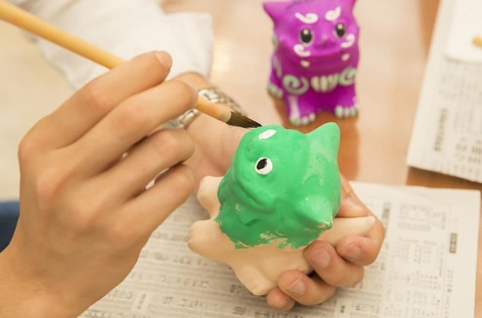 LeaLea Shuttle to Ryukyu Mura with Traditional Costume, Shisa Painting Experience & American Village Stay (From Naha/Chatan) | Okinawa