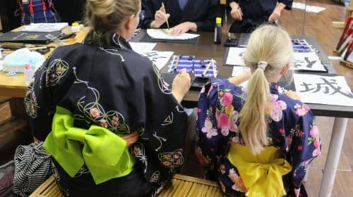 Learn Japanese calligraphy (Shodo) and Zen while wearing a kimono near Osaka Castle