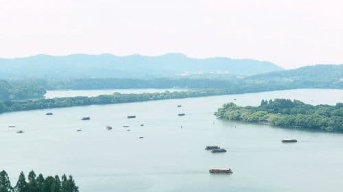 Leifeng Tower admission ticket + West Lake painted cruise (landing on Three Pools Mirroring the Moon island) ticket + live guide service Day Tours