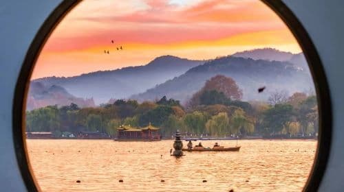 Leifeng Tower admission ticket + West Lake painted cruise (landing on Three Pools Mirroring the Moon island) ticket + live guide service Day Tours