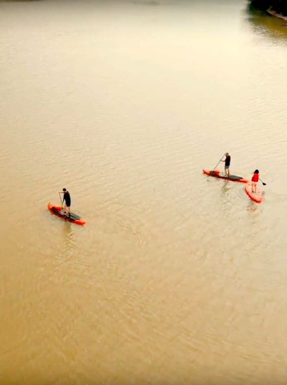 Stand Up Paddle Boarding and Sunset Watching on Cai River