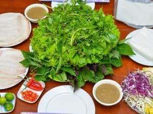 BEZIENSWAARDIGHEDEN EN VERKEN DE VIETNAMESE LOKALE ETENSTOUR