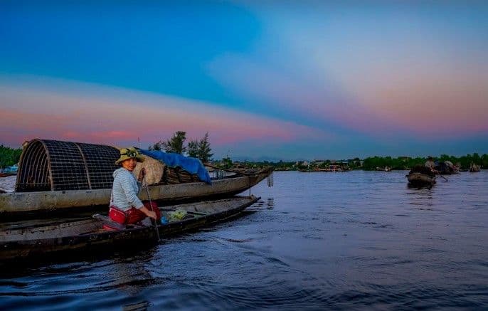 Sunrise Over Floating Market on Tam Giang Lagoon