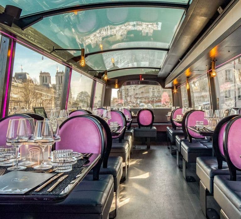 Paris : visite nocturne culturelle en bus avec dîner à bord